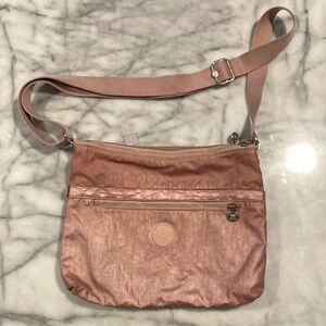 Kipling Blush Pink Crossbody Bag with Durable Fabric and Adjustable Strap